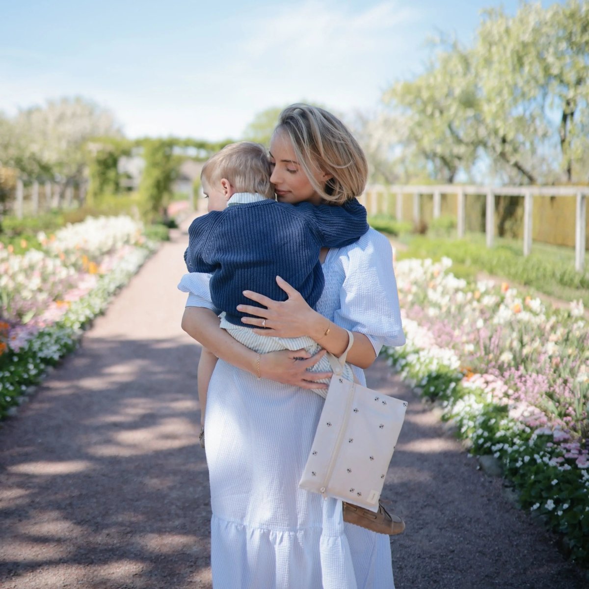 Mushie Water Resistant Wet Bag for Swimsuits and Dirty Clothes with Zipper Closure and Machine Washable Material -