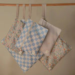 Mushie Water Resistant Wet Bag for Swimsuits and Dirty Clothes with Zipper Closure and Machine Washable Material -