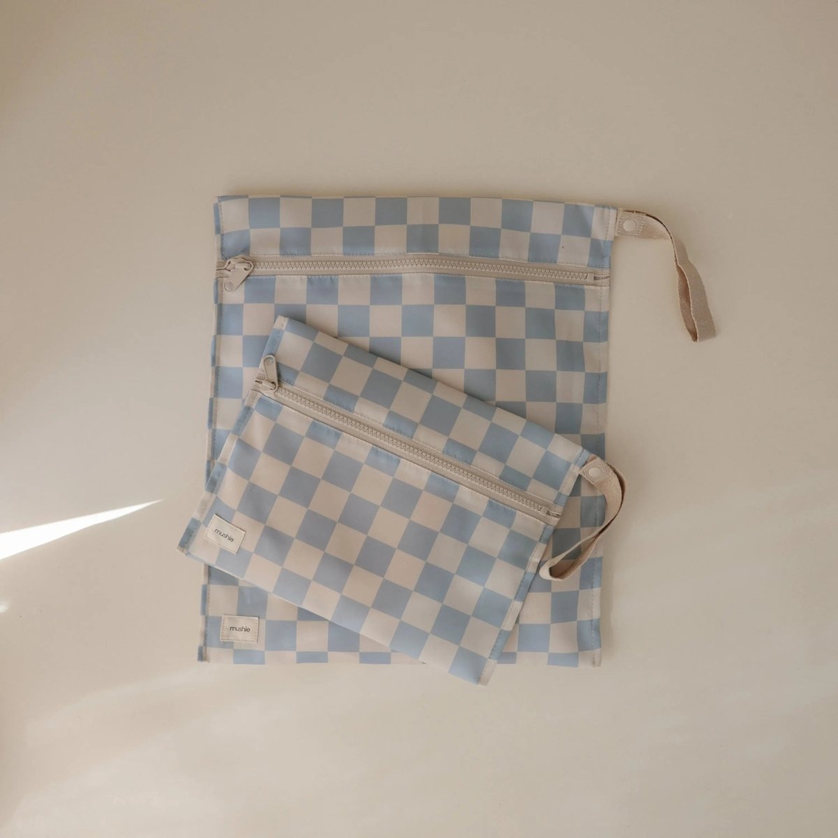 Mushie Water Resistant Wet Bag for Swimsuits and Dirty Clothes with Zipper Closure and Machine Washable Material -