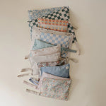 Mushie Water Resistant Wet Bag for Swimsuits and Dirty Clothes with Zipper Closure and Machine Washable Material -