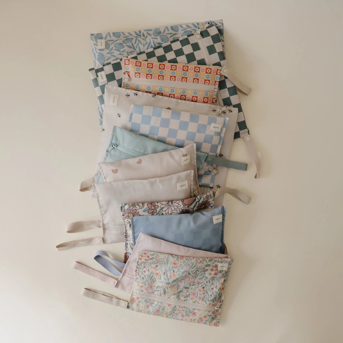 Mushie Water Resistant Wet Bag for Swimsuits and Dirty Clothes with Zipper Closure and Machine Washable Material -