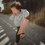 Mushie Water Resistant Wet Bag for Swimsuits and Dirty Clothes with Zipper Closure and Machine Washable Material -