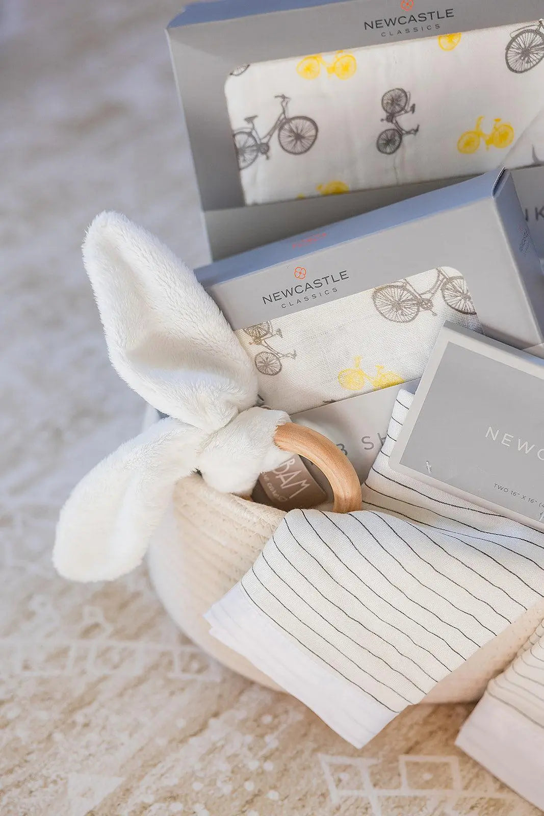 Welcome Baby Gender Neutral Gift Basket with Bamboo Blanket Swaddle Crib Sheet and Wooden Teether Newcastle Classics