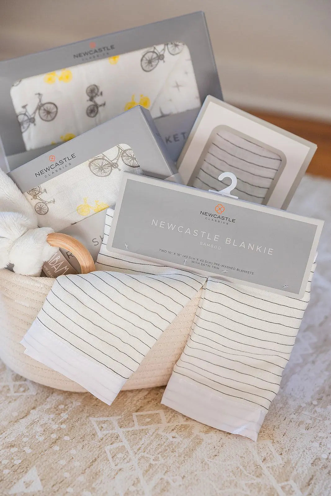Welcome Baby Gender Neutral Gift Basket with Bamboo Blanket Swaddle Crib Sheet and Wooden Teether Newcastle Classics