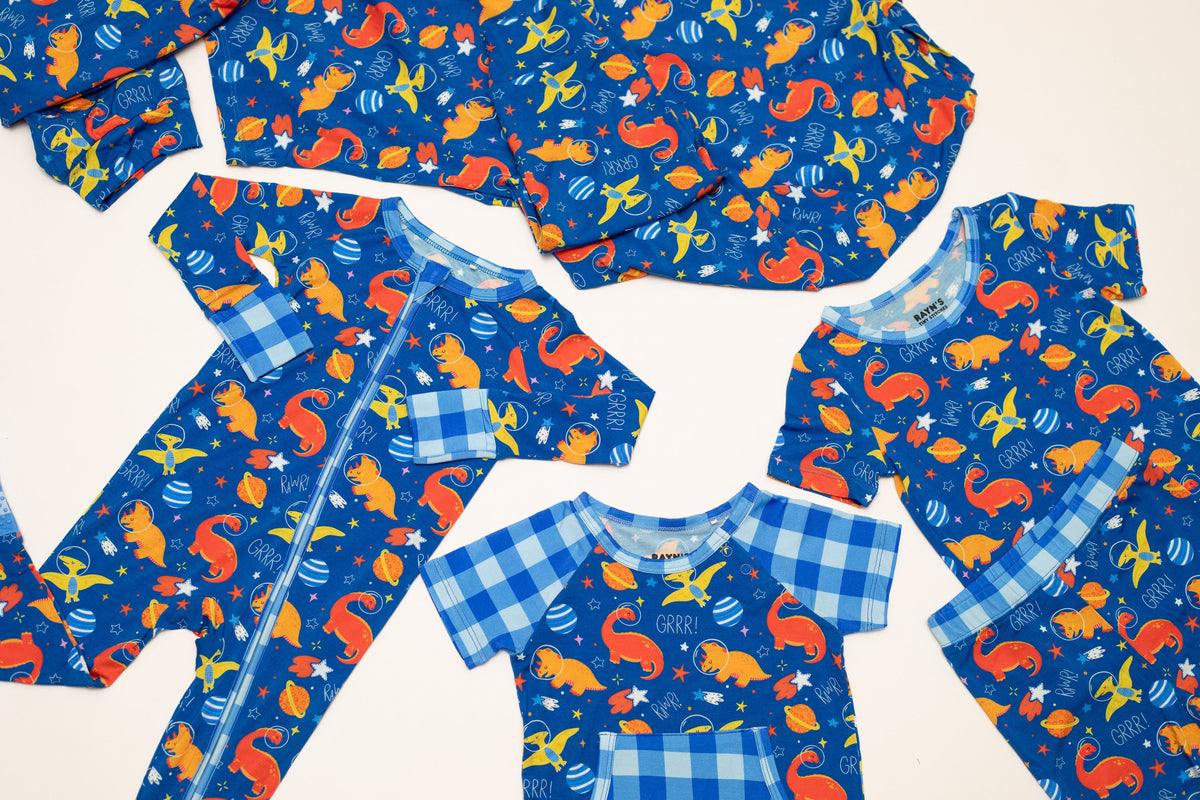 Space Dinosaur Bamboo Short Romper | Electric Blue by Rayn’s Tiny Stitches