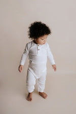 Three Little Tots White Baby Ribbed Playsuit with pockets - 