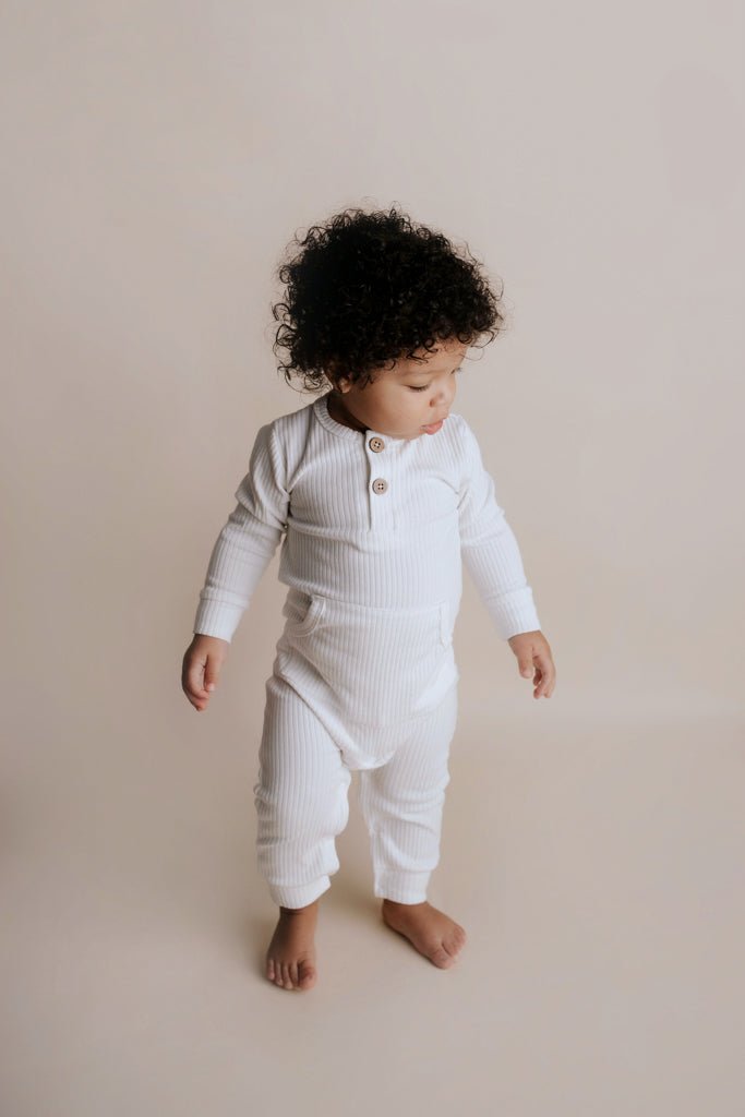 Three Little Tots White Baby Ribbed Playsuit with pockets - 