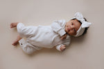 Three Little Tots White Baby Ribbed Playsuit with pockets - 