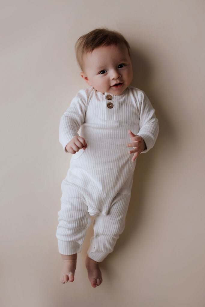 Three Little Tots White Baby Ribbed Playsuit with pockets - 