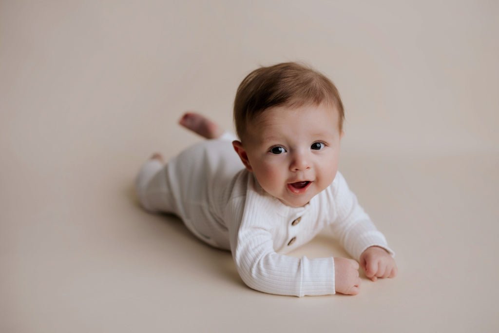 Three Little Tots White Baby Ribbed Playsuit with pockets - 