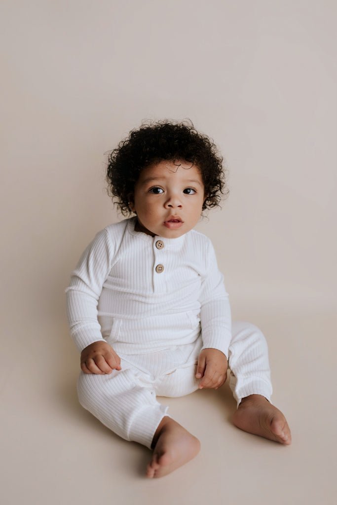 Three Little Tots White Baby Ribbed Playsuit with pockets - 