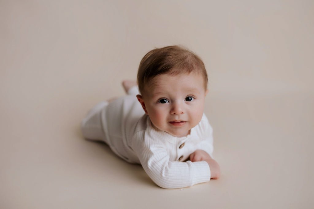 Three Little Tots White Baby Ribbed Playsuit with pockets - 