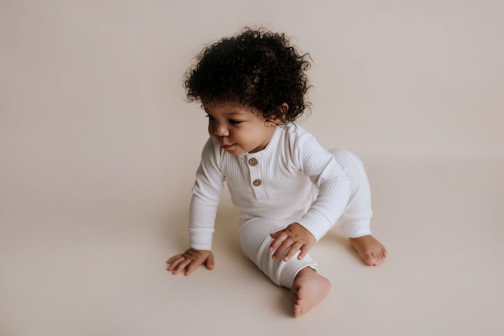 Three Little Tots White Baby Ribbed Playsuit with pockets - 