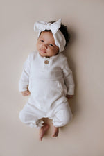 Three Little Tots White Baby Ribbed Playsuit with pockets - 