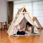 Extra large kids play tent with wooden poles, a play mat, and star lights set up as an indoor playhouse.
