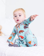 Baby footie pajamas in Wild Things animal print with full-length two-way zipper and covered feet