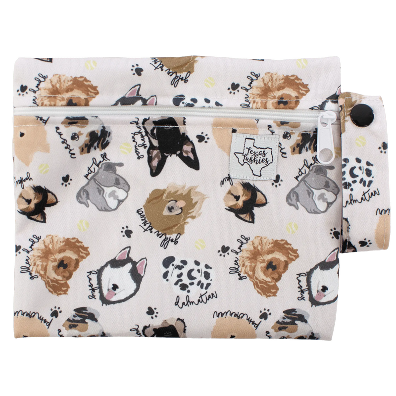 Mini Wet Bag with cute dog pattern, compact for snacks, pacifiers, or single diaper.