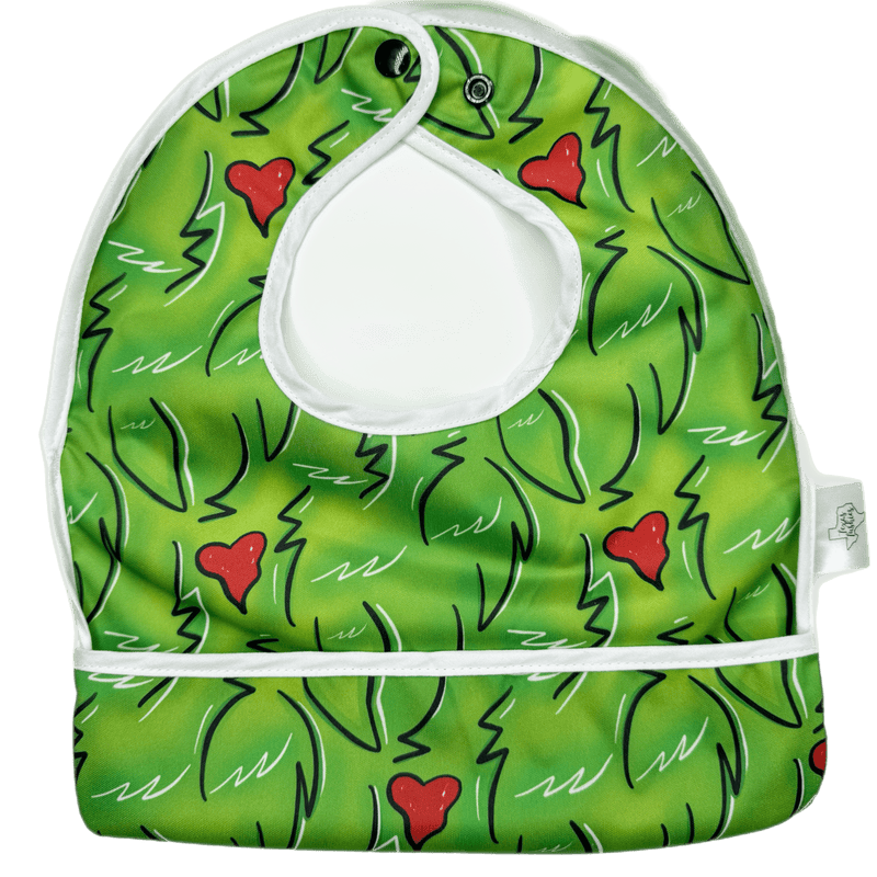 You're A Mean One flip bib with pocket, green and red design, water-resistant, machine washable.