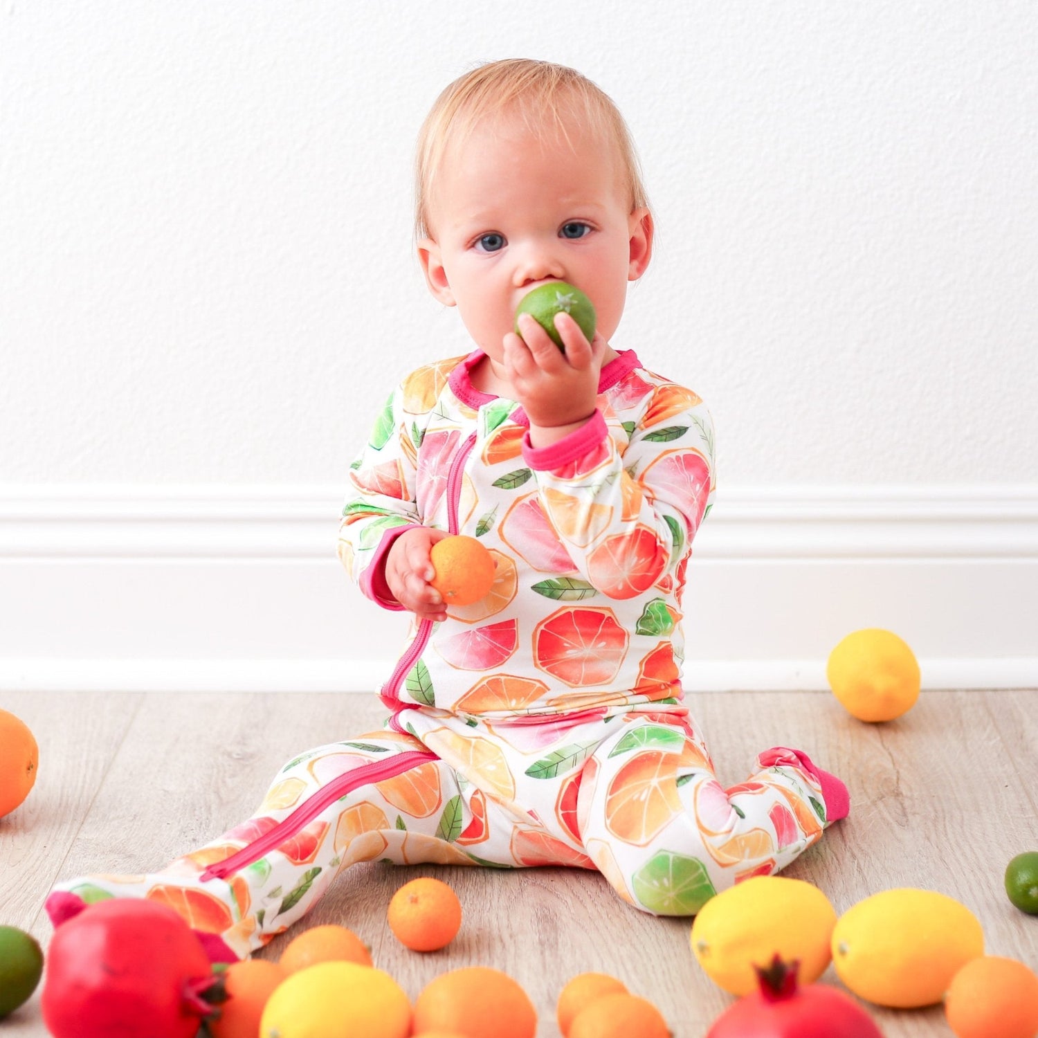 Baby footie pajamas with full-length zipper and covered feet
