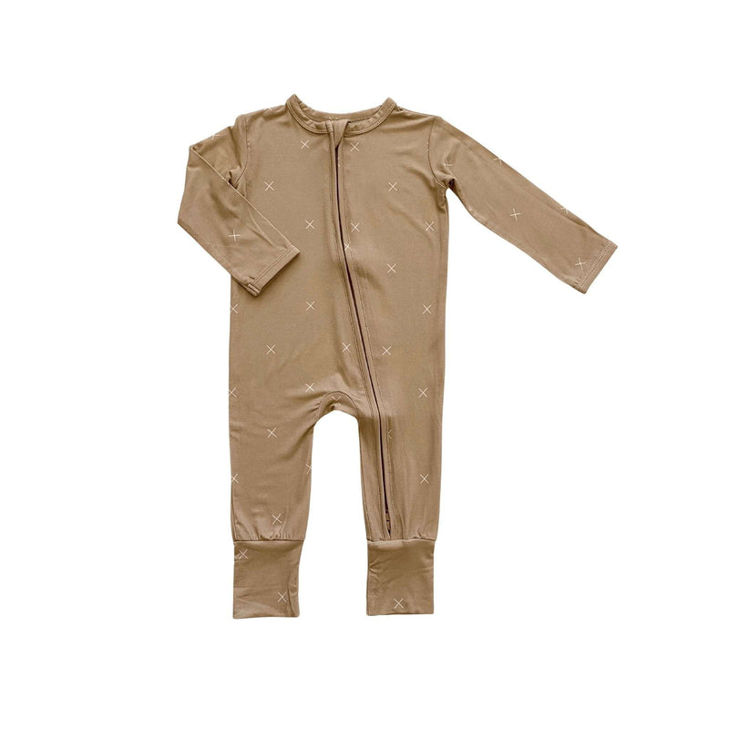 Beige zipper romper with X pattern, bamboo viscose, fold-over cuffs.